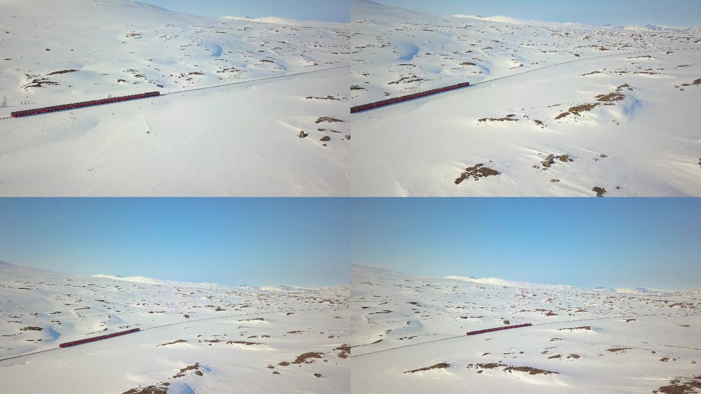 火车在一个雪谷中央经过