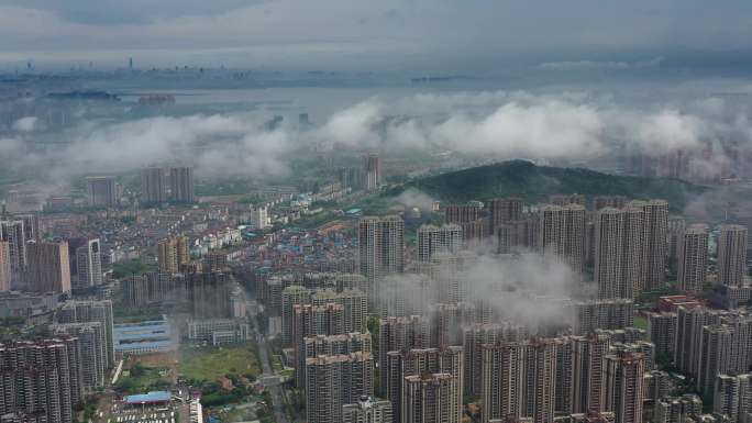 航拍湖北武汉雨过天晴云朵之上平流雾