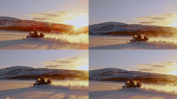 在日落时骑着摩托雪橇穿过雪地