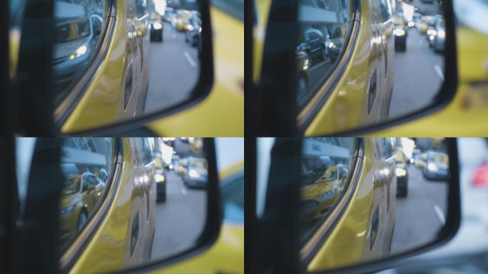 出租车侧视镜反光镜行驶在路上堵车