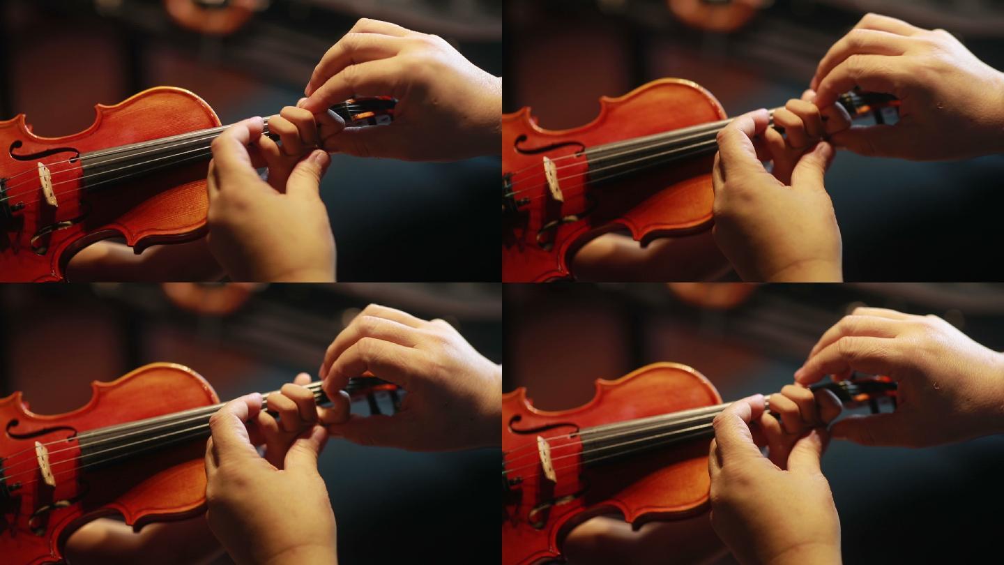 学习拉小提琴的小孩