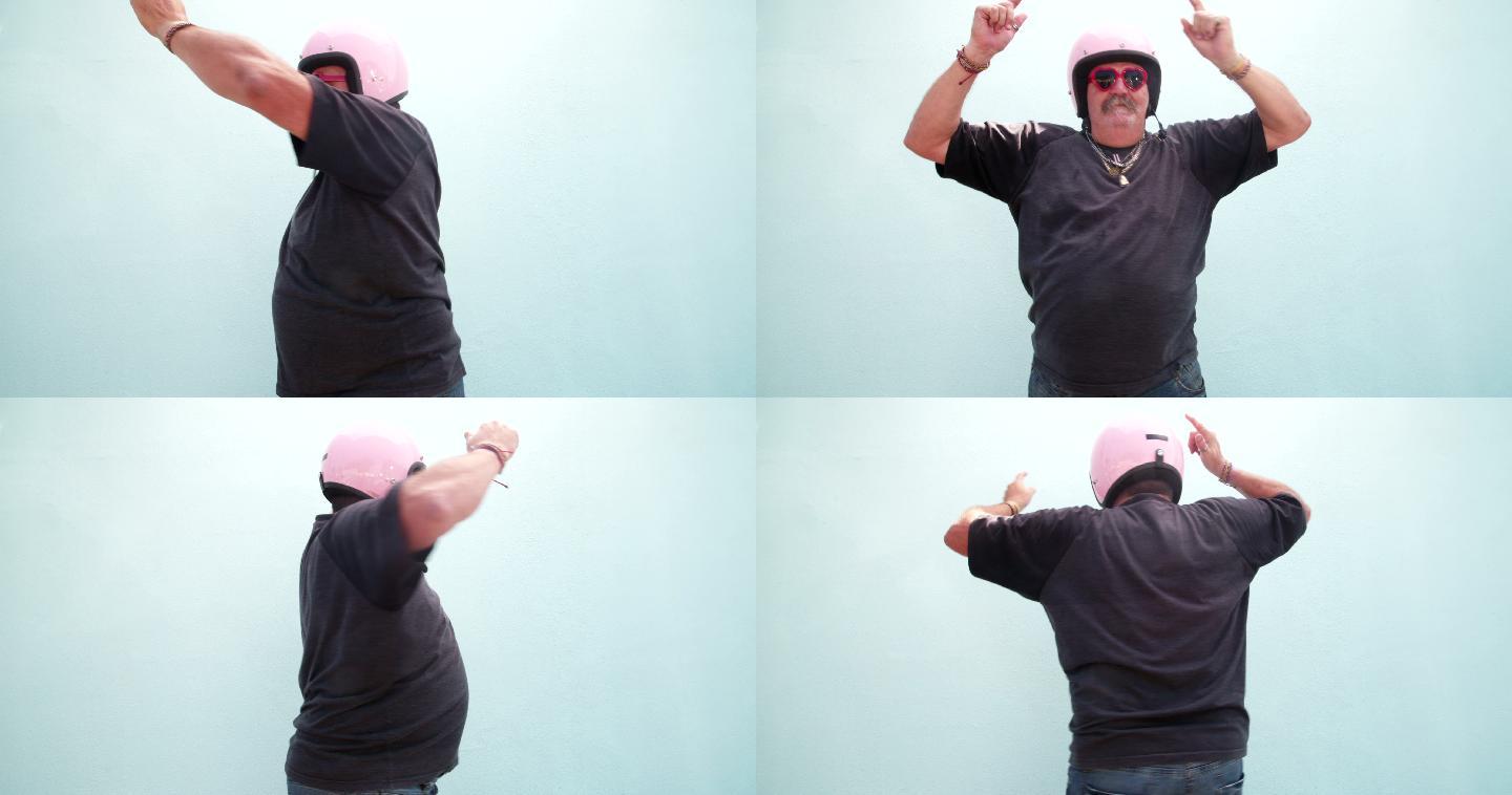 戴粉红色头盔跳舞的男子
