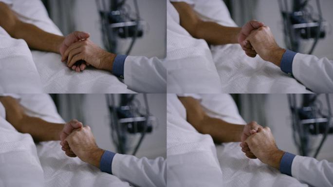 握着病人的手