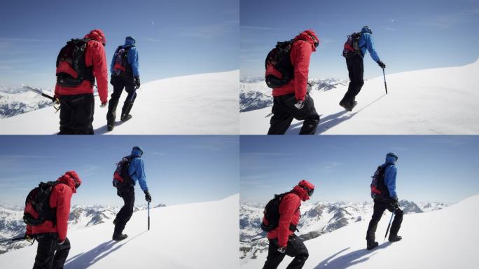登山者在白雪覆盖的山上行走