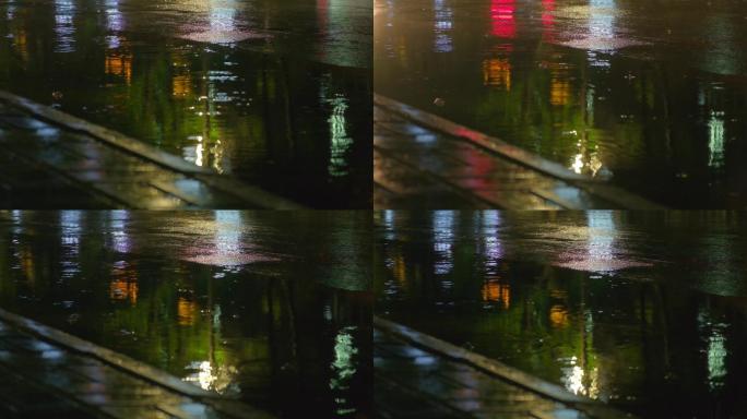夜晚下雨-路面雨水雨滴车流特写