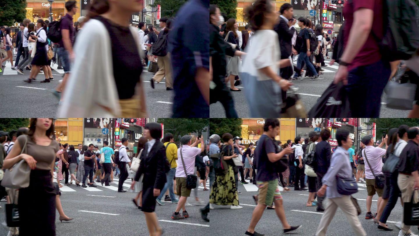 行人在日本东京涉谷路口过马路