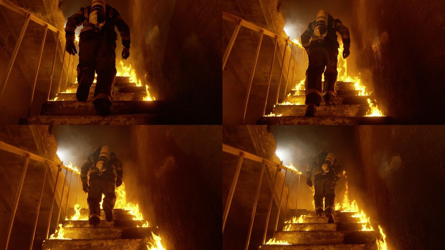 勇敢的消防队员跑上燃烧的楼梯