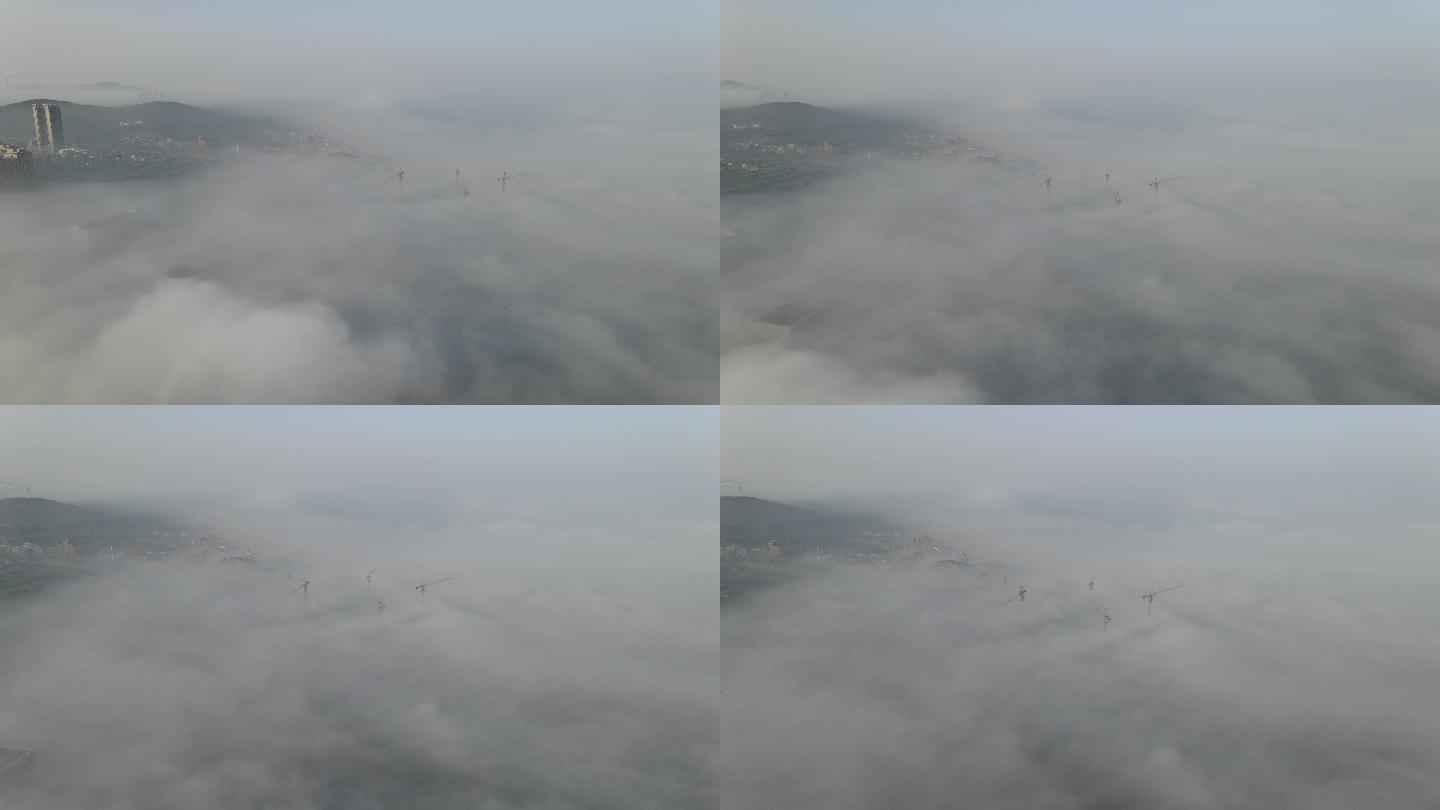 无人机航拍平流雾下塔吊