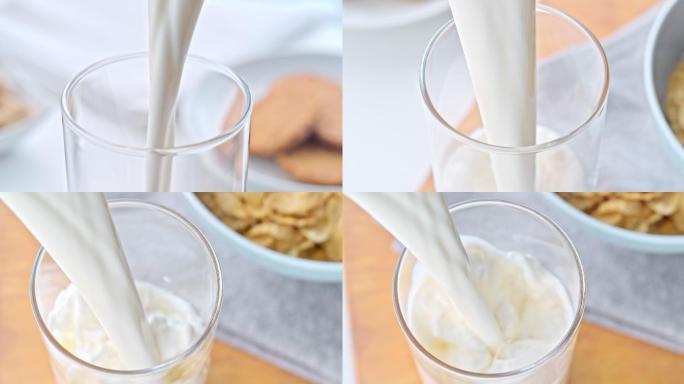 把牛奶倒进杯子里营养早餐蒙牛伊利蛋白质