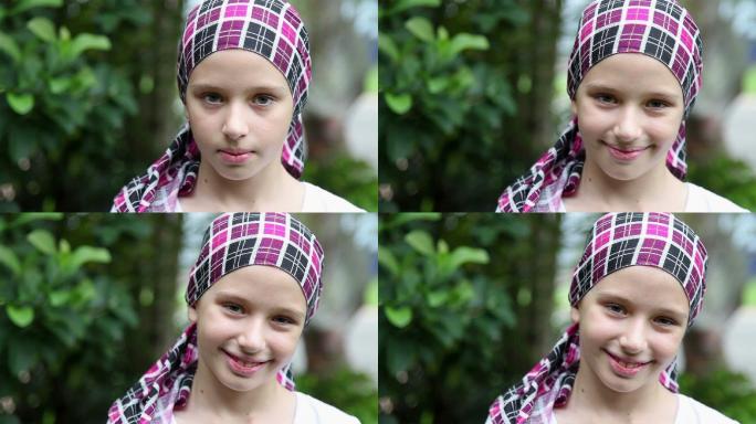 年轻女孩微笑，癌症幸存者