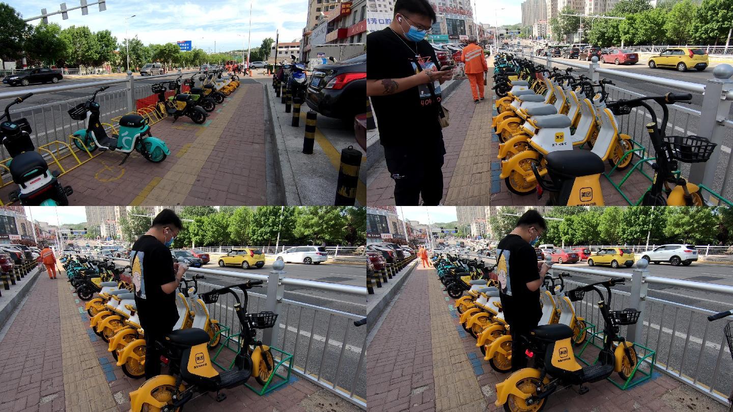 城市街道停放的共享电单车扫码骑行
