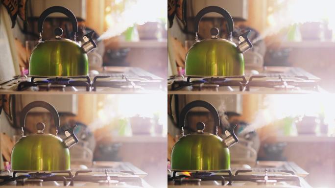 煮沸的绿色水壶烧水煮水热水沸水天然气