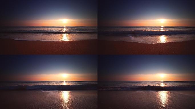 日出，日落的海滩，海浪冲沙