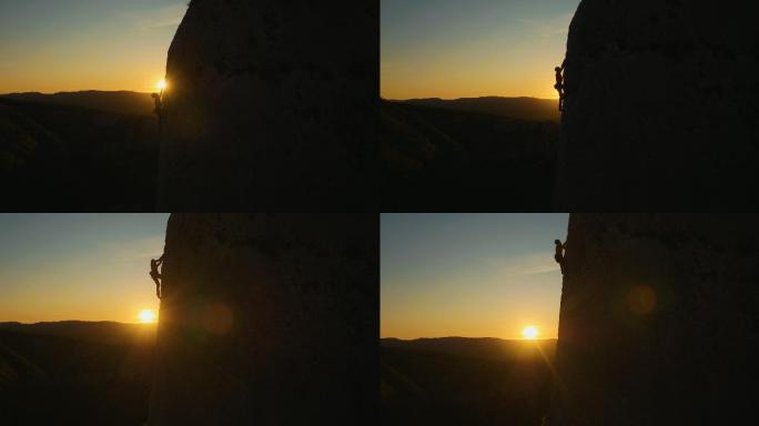 日落攀岩励志故事素材逆光剪影向上攀爬