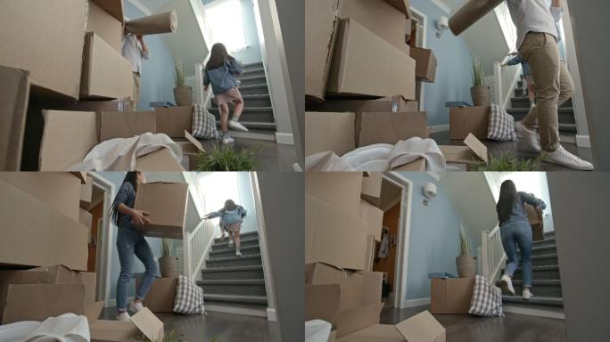 一家人正在搬家纸箱子全家搬运