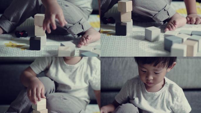 在玩积木的小男孩小孩玩积木儿童搭积木智力