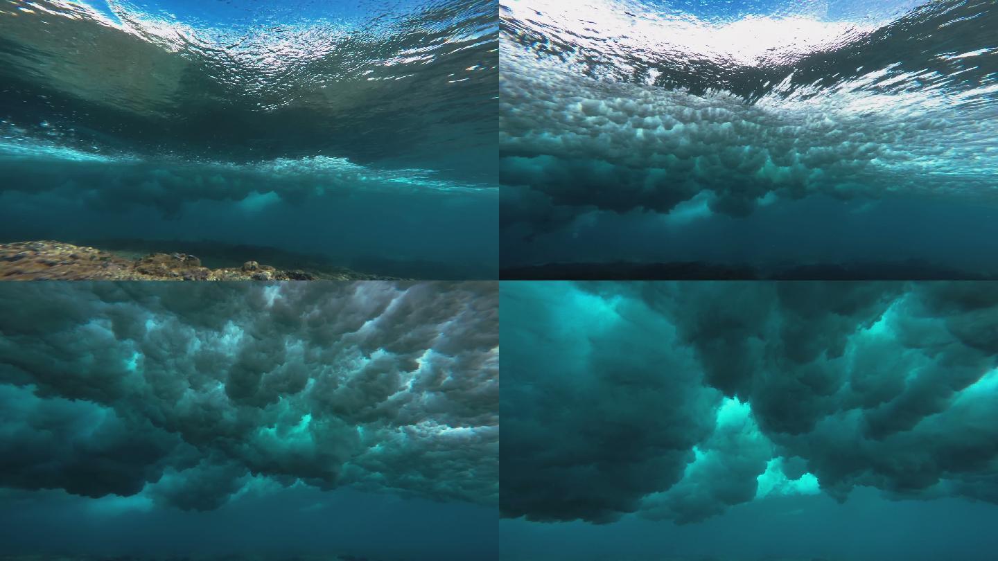 水下海浪撞击浅海礁石的超慢镜头