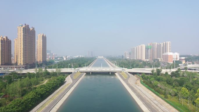 4K航拍南水北调河流穿过城市风景