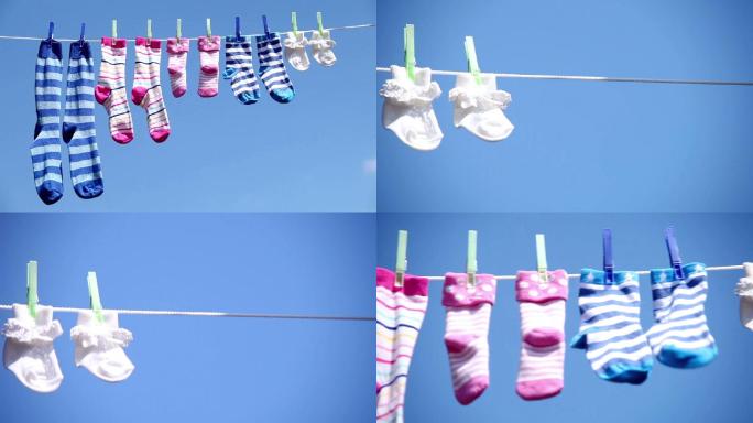 一家人的彩色袜子挂在晾衣绳上