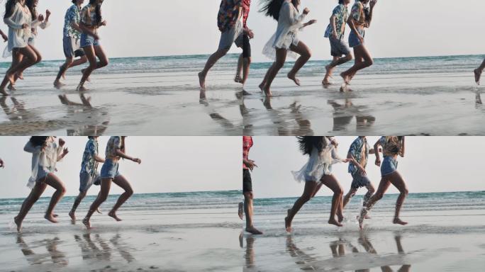 一群朋友在沙滩上奔跑