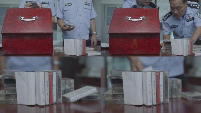 老式箱子旧磁带警察破案办案观察