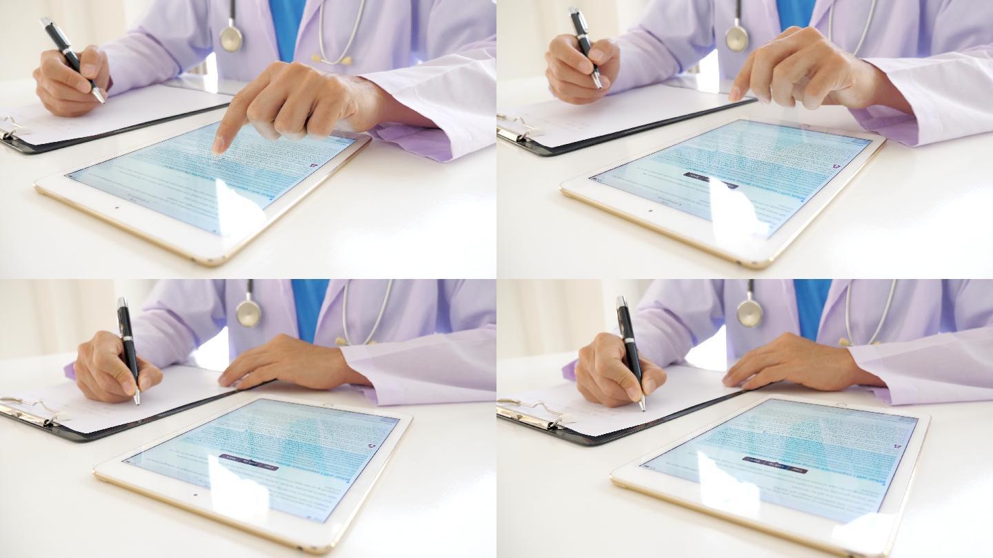 医院医生使用数字化平板电脑书写病历