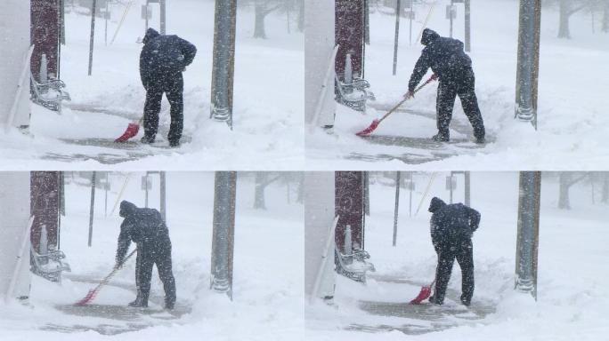 男子铲雪