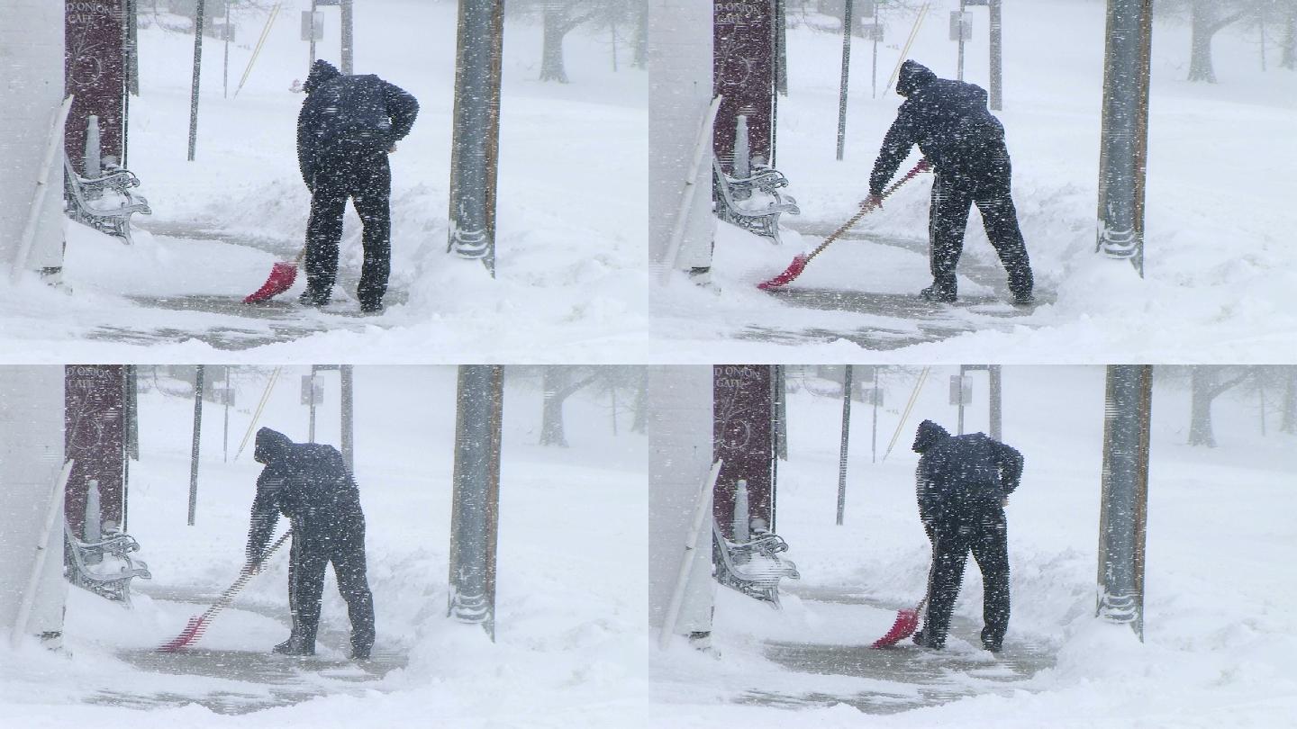 男子铲雪