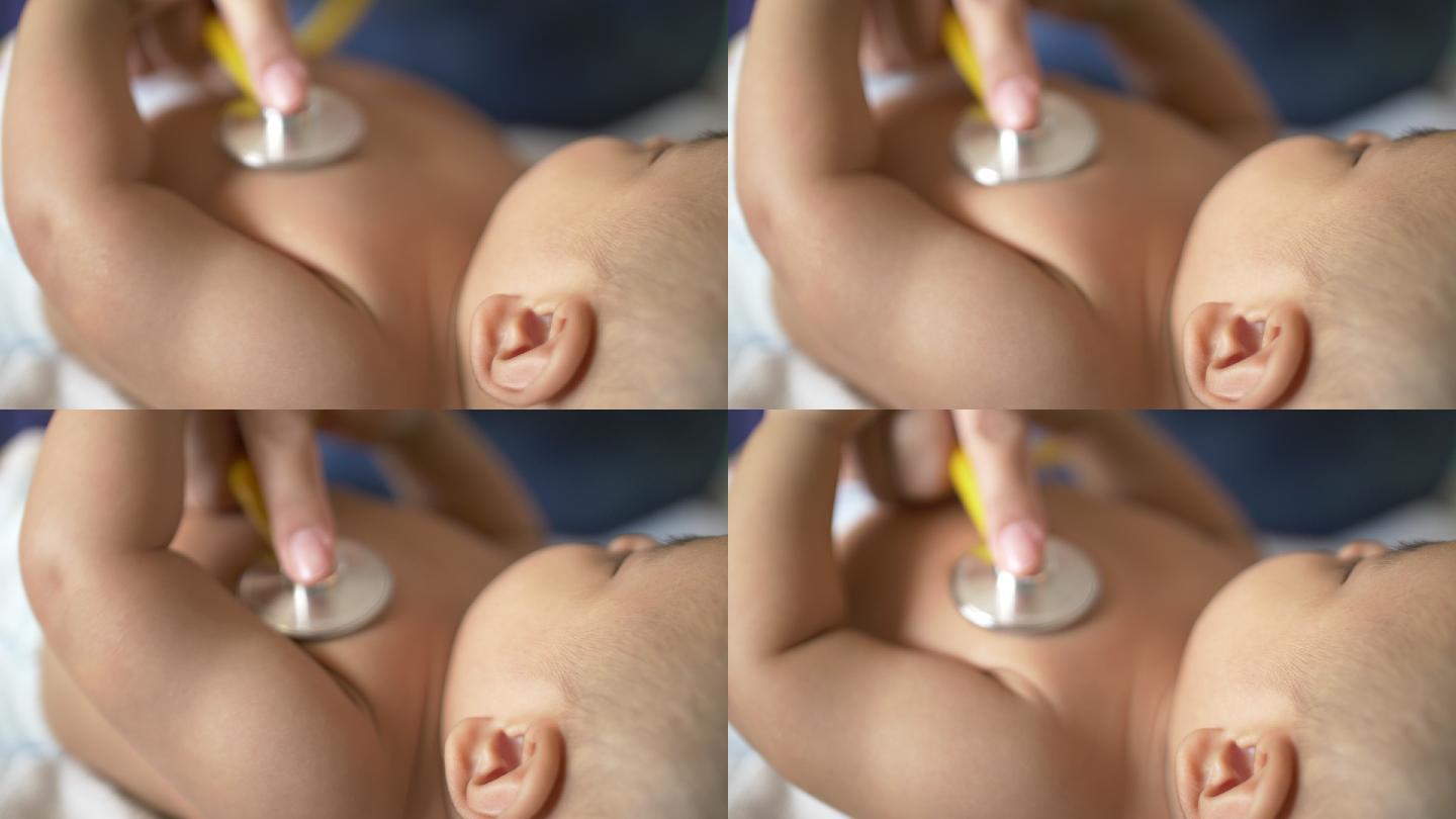 婴儿听诊器检查婴儿亲子互动母婴家庭温馨聚