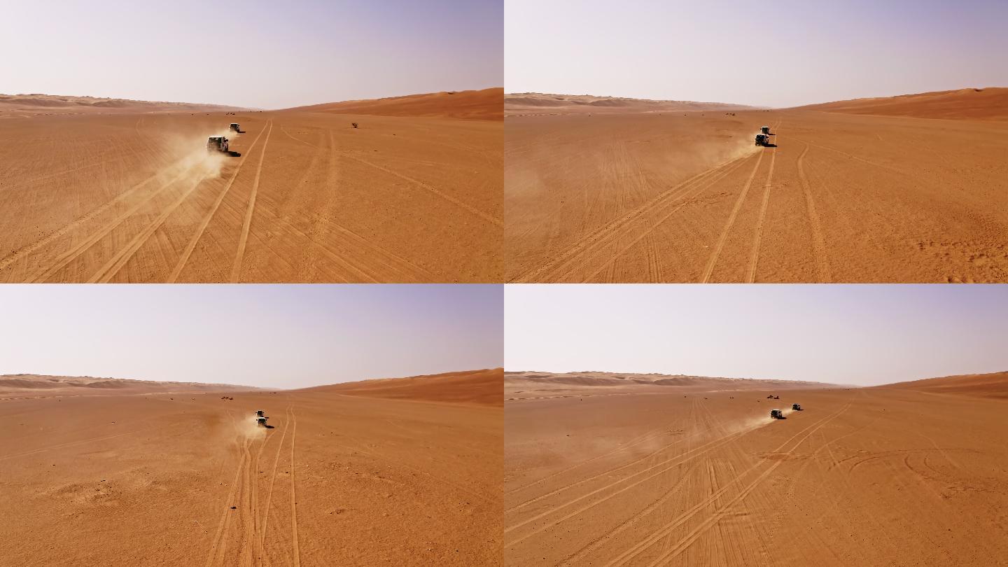 穿越沙漠的越野车航拍新疆沙漠公路汽车越野