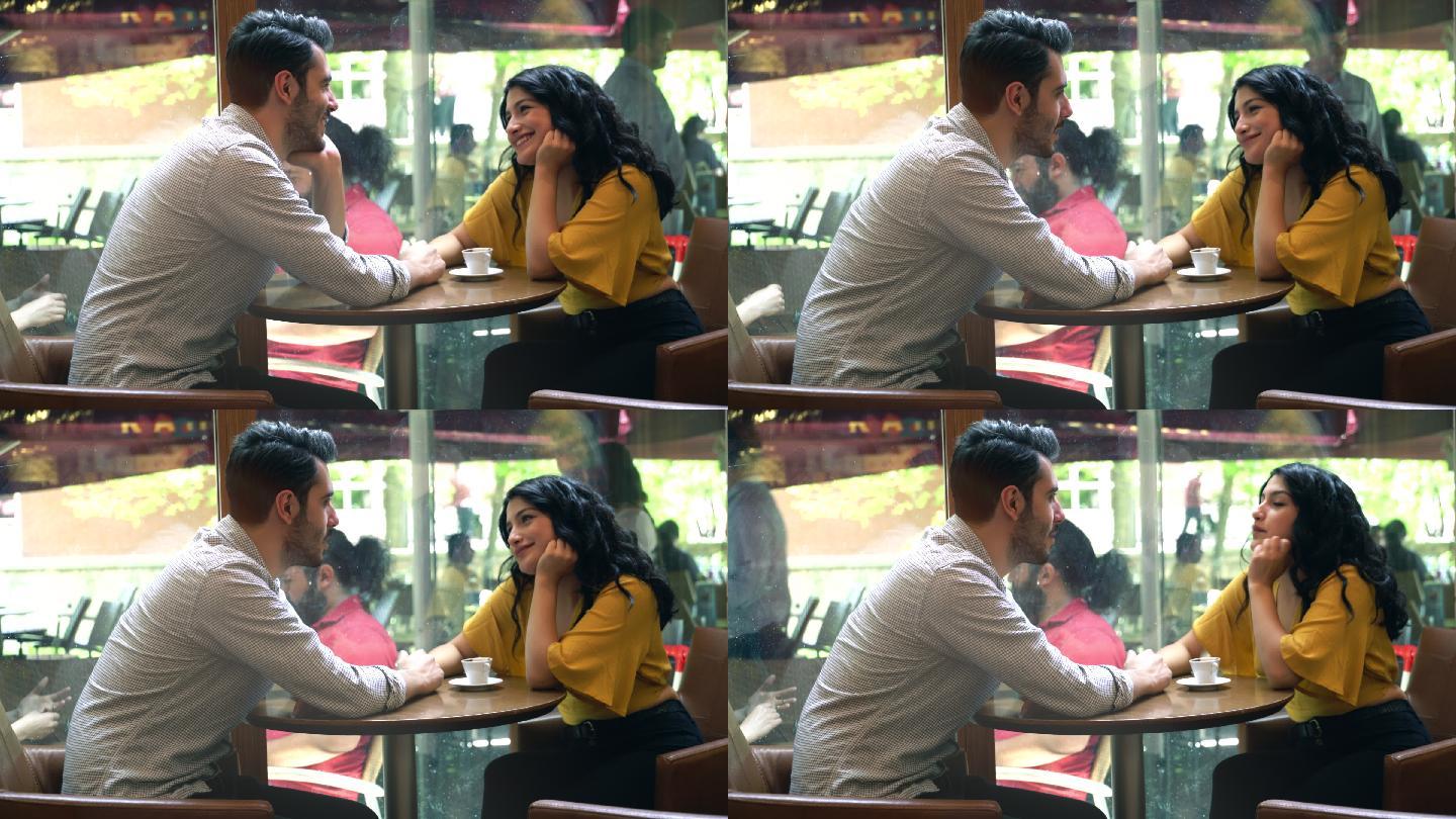 一对情侣在咖啡厅喝咖啡
