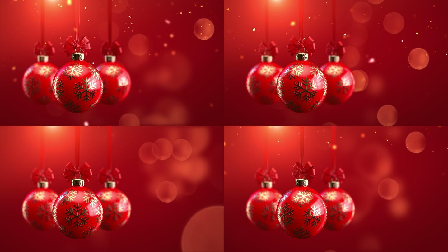 三个红色装饰的圣诞球与蝴蝶结