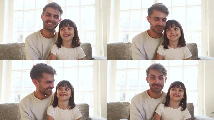 快乐的小女孩和爸爸挥手录制视频日志