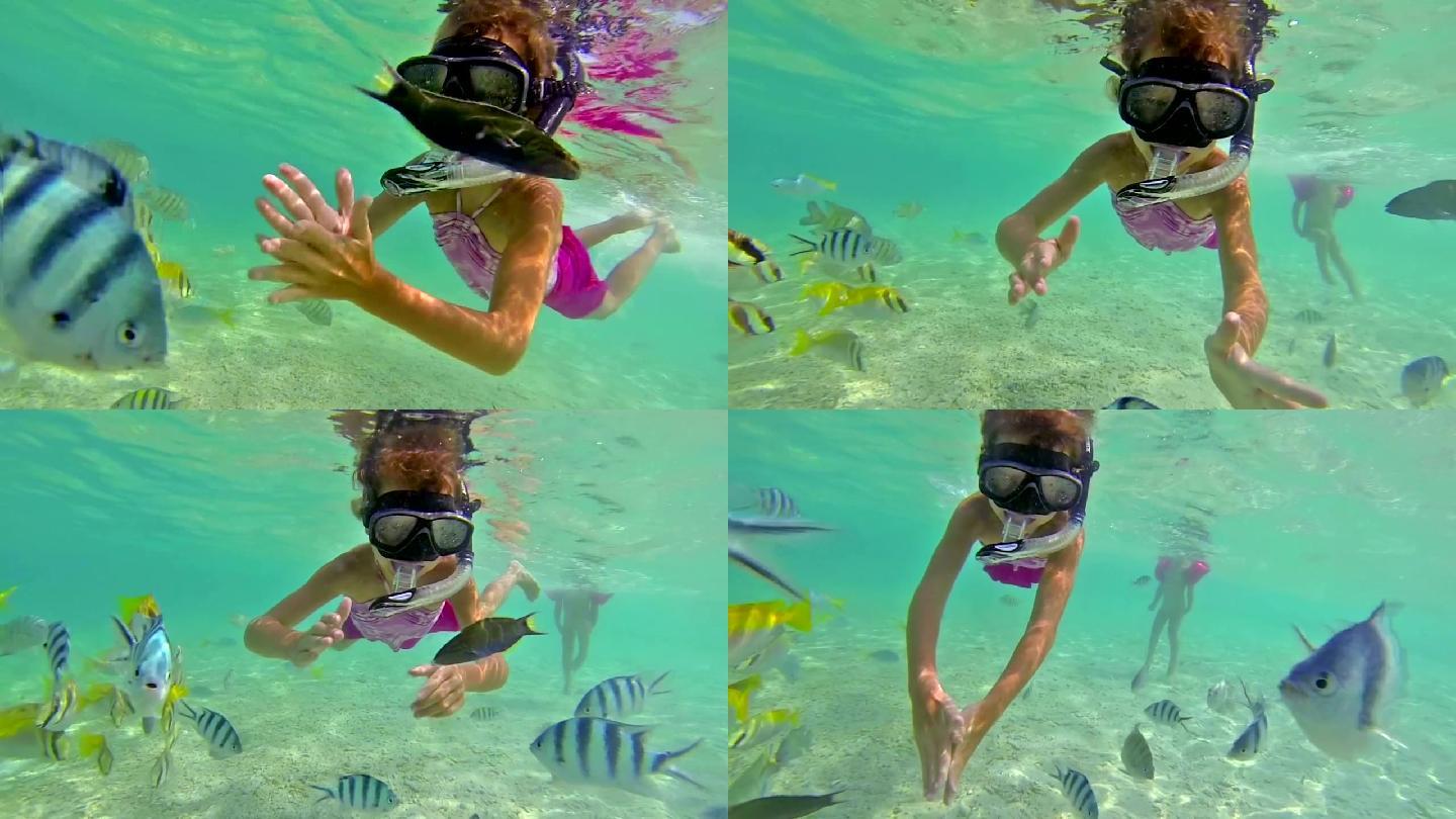 在水下浮潜的女孩潜泳水底戏水海里生物