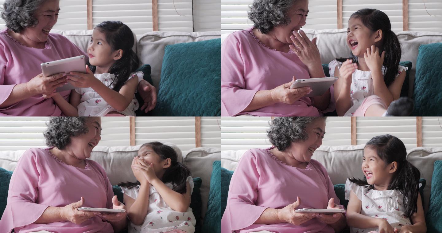 奶奶和孙女使用平板电脑