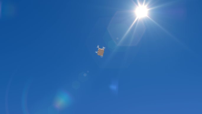 无人机带着一个包裹在蓝天上飞行