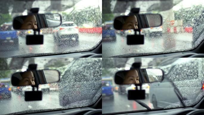 雨中开车的女人