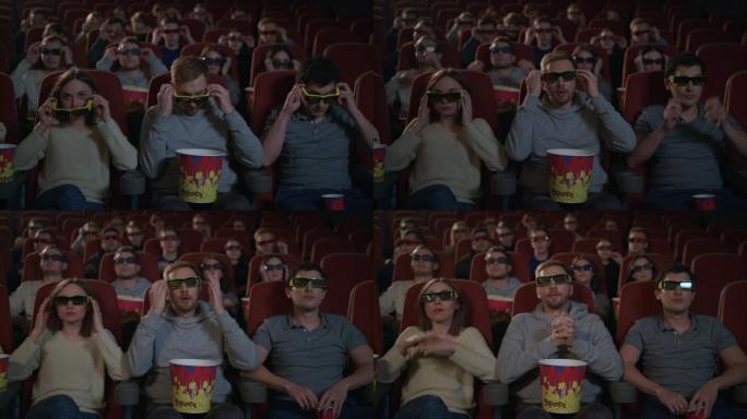 在电影院戴3d电影眼镜的观众