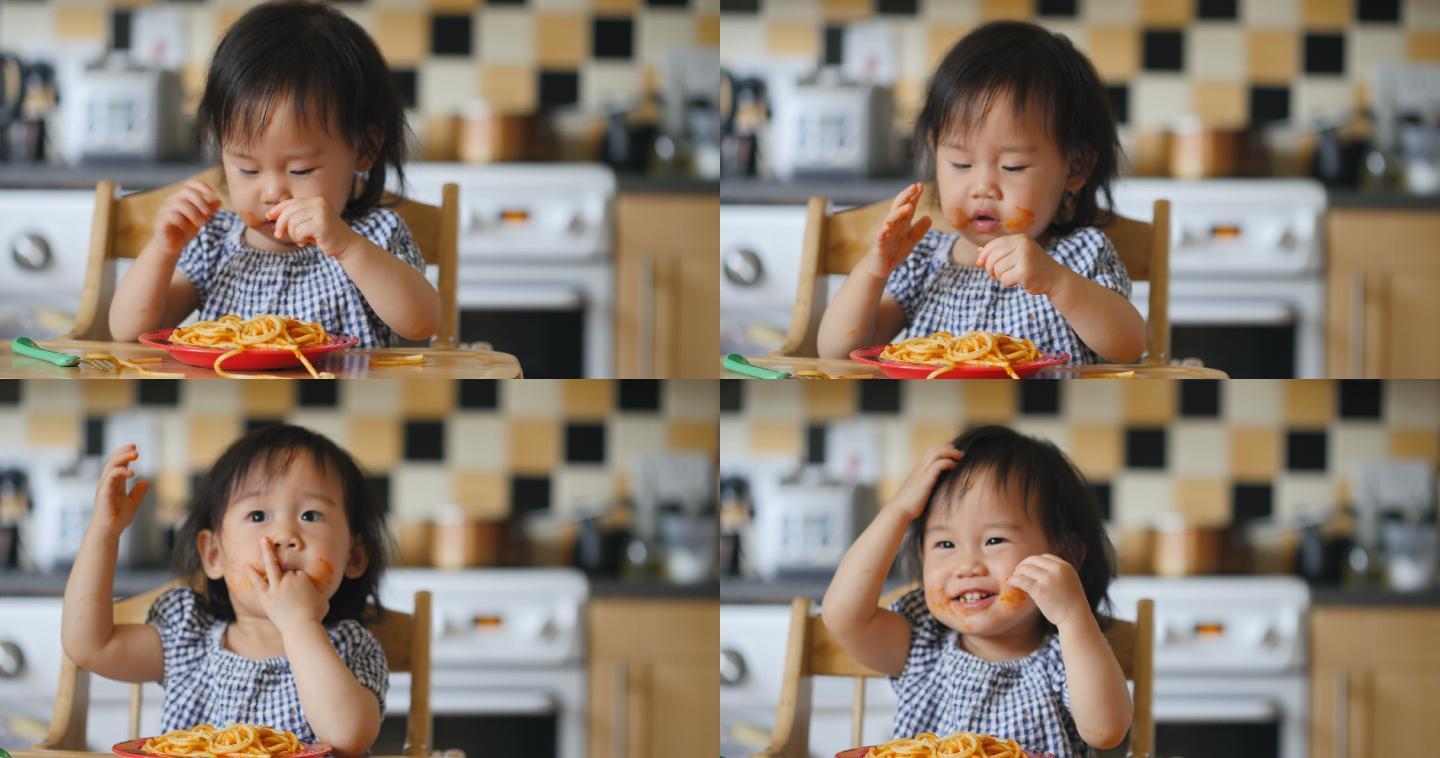 女婴在吃意大利面