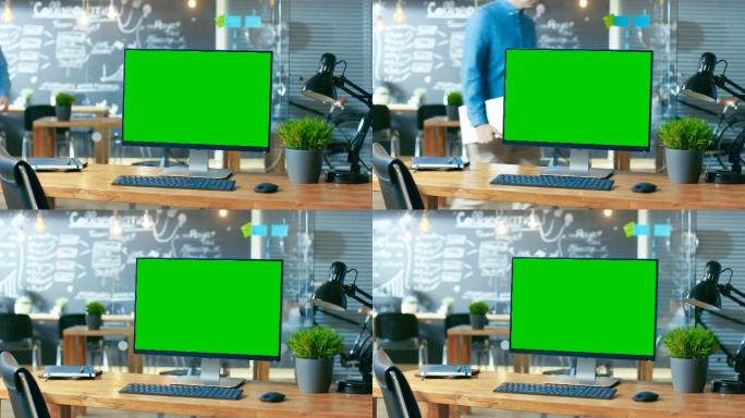 一台带有绿屏的个人电脑，