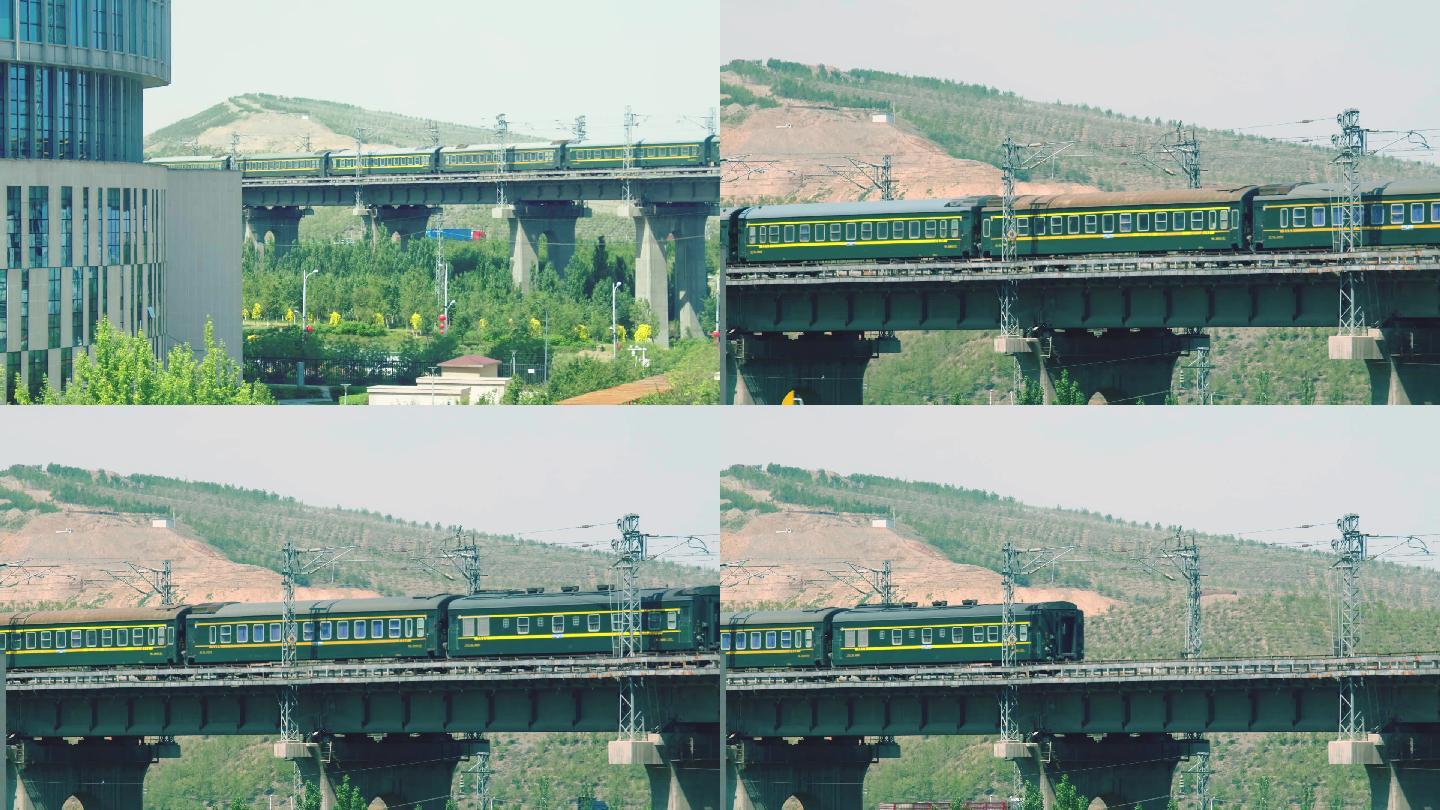 新疆和谐号绿皮动车经过软件园旁高架桥