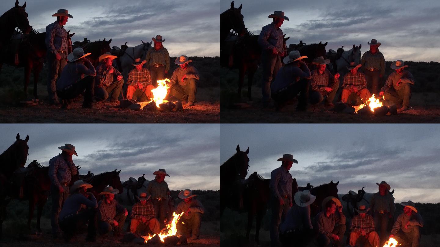 牛仔们围着篝火