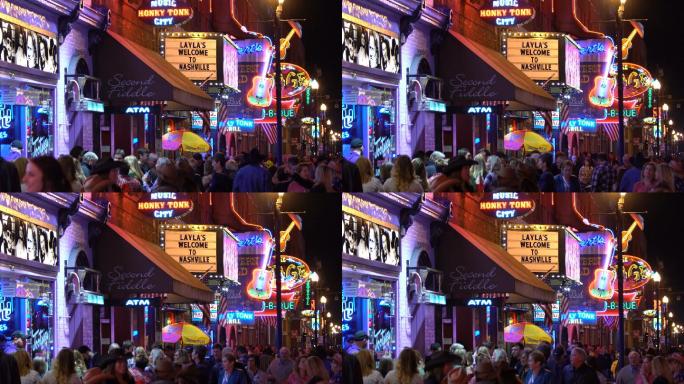街道上有酒吧和酒吧的霓虹灯标志
