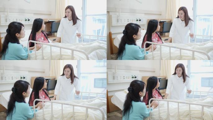 儿科护士在病房安抚母女的慢镜头