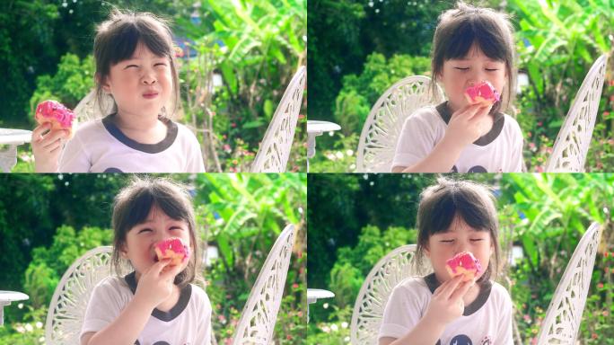 小女孩在吃好吃的甜点。