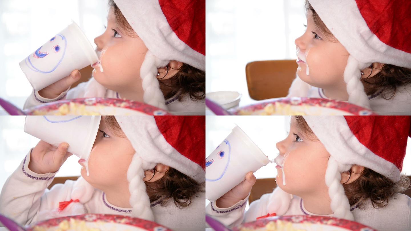 圣诞女婴喝酸奶