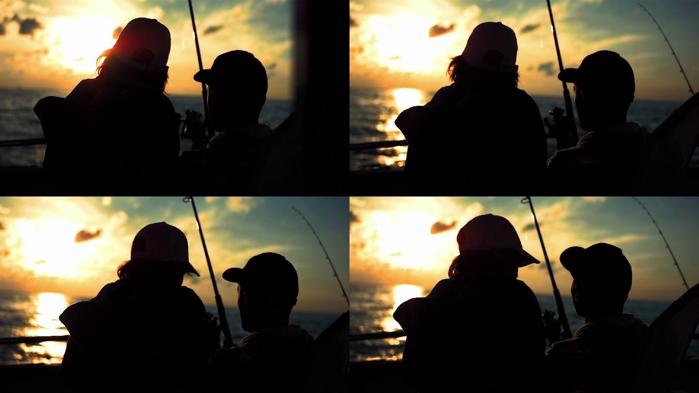 父亲和儿子在船上钓鱼