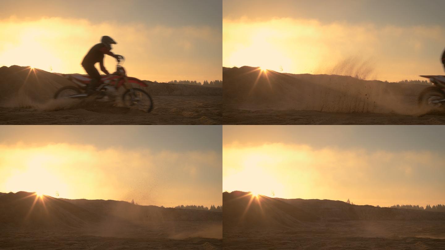 摩托车骑手驾驶越野车穿过沙地