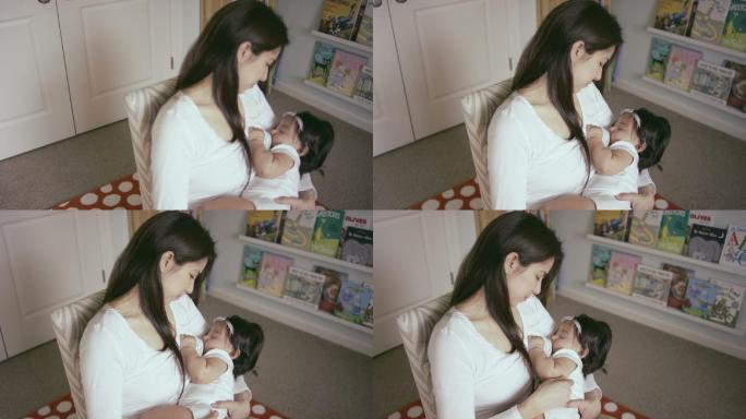 母亲照顾女儿睡着