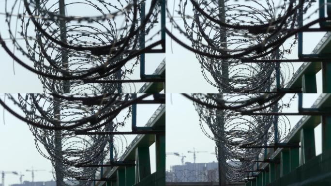 铁丝网在篱笆上。监狱围栏。
